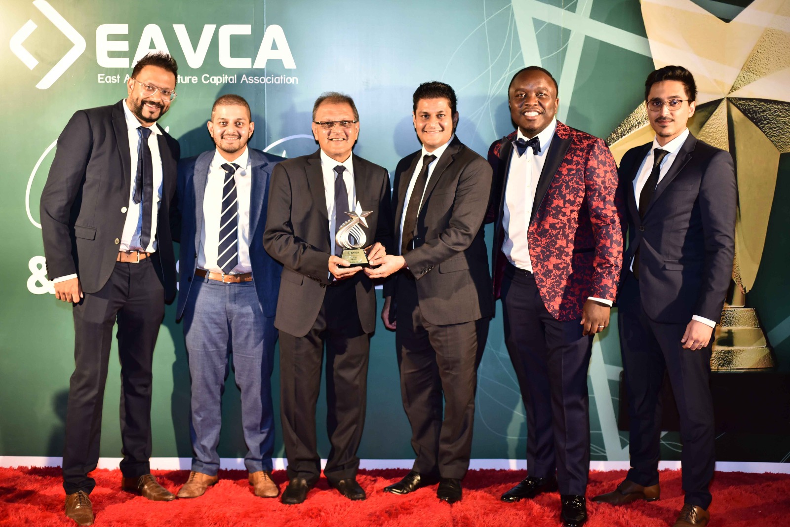 The Chandaria Capital team accepting an EAVCA award